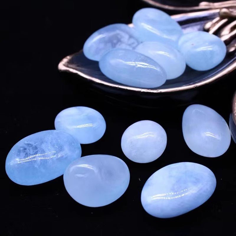 Aquamarine light blue tumble stone for courage and clarity