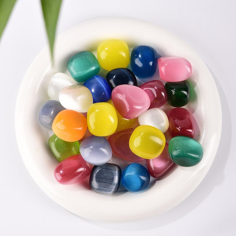Polished Cat's Eye stone tumbles for protection and luck