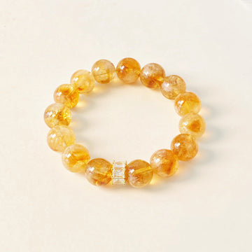 Yellow Aura Quartz Wealth Bracelet featuring a Citrine Tower bead for attracting success and abundance.