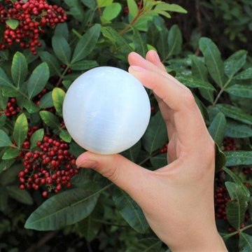Purify your space with this self-cleansing Moroccan Selenite sphere, emitting a high-vibration light to clear negativity.