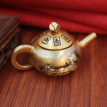 A unique gamer good luck charm. This spinning brass teapot is inspired by the "Instant Win" Mahjong tile for a competitive edge.