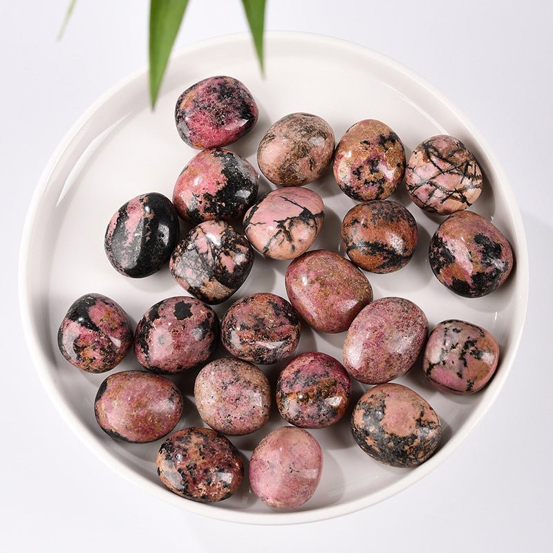 Rhodonite pink tumble stone for emotional balance and compassion