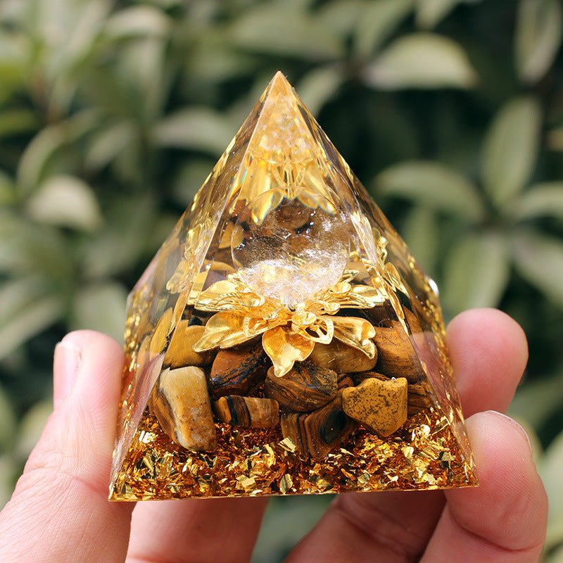 Clear quartz pyramid with large leaf inclusion for connecting with nature's energy.