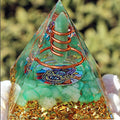 Green Aventurine crystal point pyramid for attracting prosperity and heart chakra healing.