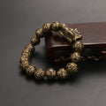 A spiritual bracelet combining the Pi Yao money attractor with the sacred Om Mani Padme Hum mantra.