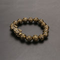 Men's bracelet with Pi Yao talisman and Om Mani Padme Hum beads made of brass.