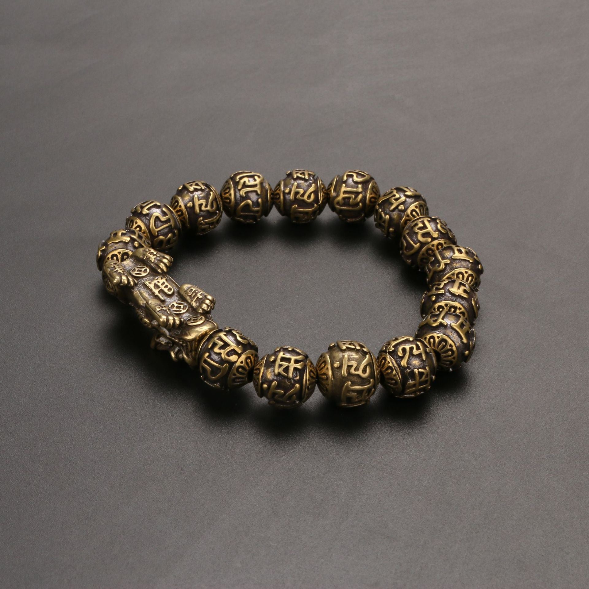 Men's bracelet with Pi Yao talisman and Om Mani Padme Hum beads made of brass.