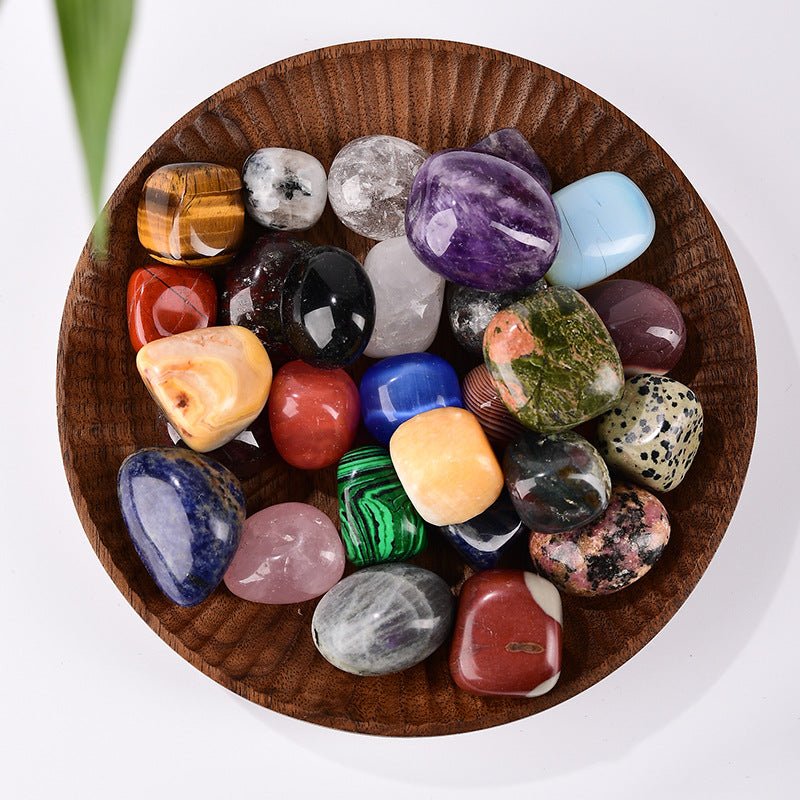 A complete set of polished crystal energy stones for aromatherapy, Reiki healing, and meditation practices.