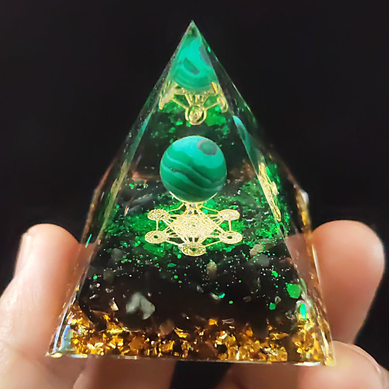 Malachite sphere crystal pyramid for transformation, healing, and positive change.
