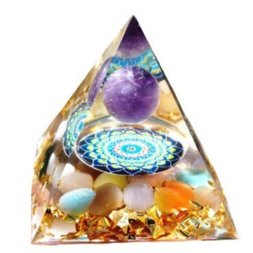 Crystal pyramid with a purple cat's eye stone for intuition and mystical energy.