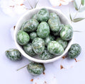 Green Spot Stone crystal egg for growth, new beginnings, and attracting abundance