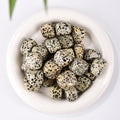Speckled Stone tumbles for balancing and stability