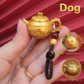 Personalized Dog Zodiac keychain with spinning teapot, a loyal charm for friendship, protection, and unwavering loyalty.