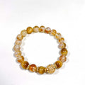 Wrap yourself in abundance with this protective double strand bracelet of Tiger's Eye and Citrine.