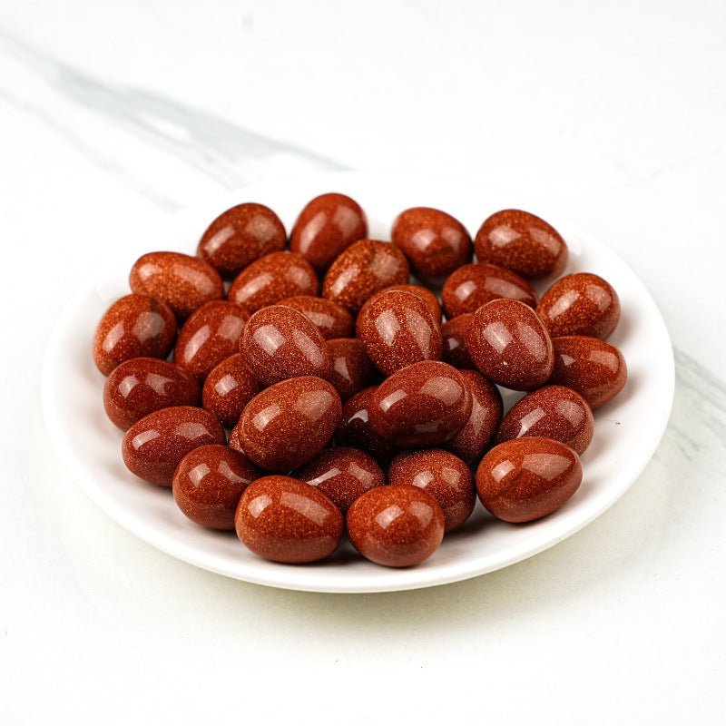 Goldstone crystal egg for ambition, energy, and boosting self-esteem