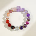 A powerful talisman for protection and heart-opening, this Super Seven bracelet shields while attracting love.