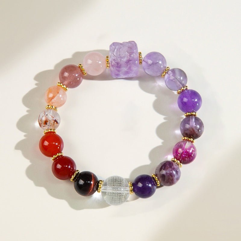 A powerful talisman for protection and heart-opening, this Super Seven bracelet shields while attracting love.