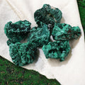 Malachite raw diffuser stone for transformation, heart healing, and absorbing negative energy