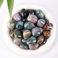 Moss Agate tumbled stone with dendritic inclusions for abundance