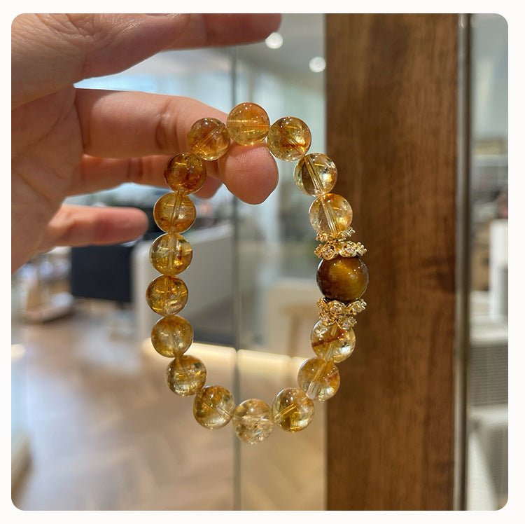 Wealth Manifestation Bracelet with Tiger's Eye and Citrine stones for attracting abundance and success.