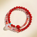 Red jasper or carnelian bead capturing the Fire element for energy and passion.