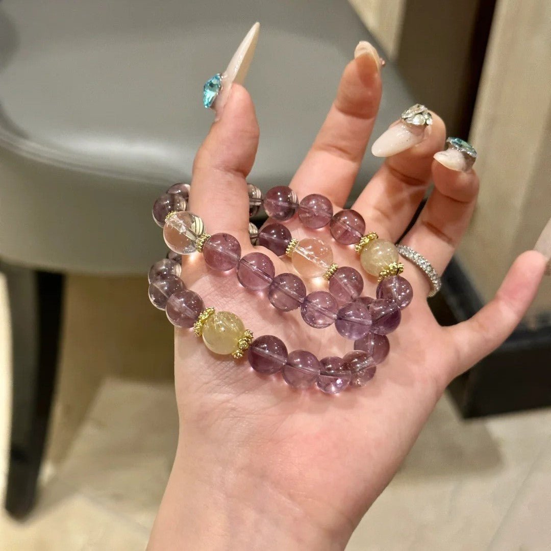 The Purple Aura Quartz bracelet with tower beads, ready to wear for chakra balance and attracting wealth.