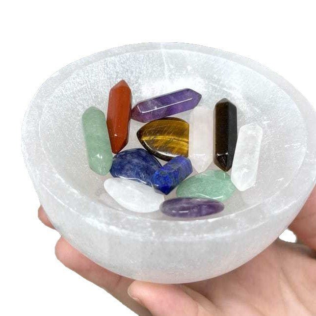 Hold your sacred crystals in this glowing Moroccan Selenite bowl to continuously cleanse and recharge their energy.
