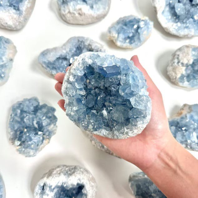 Connect to the angelic realm with this heavenly blue Celestite cluster, a stone for divine communication and peace.