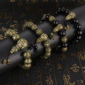 Om Mani Padme Hum mala bracelet made of antique brass and black obsidian