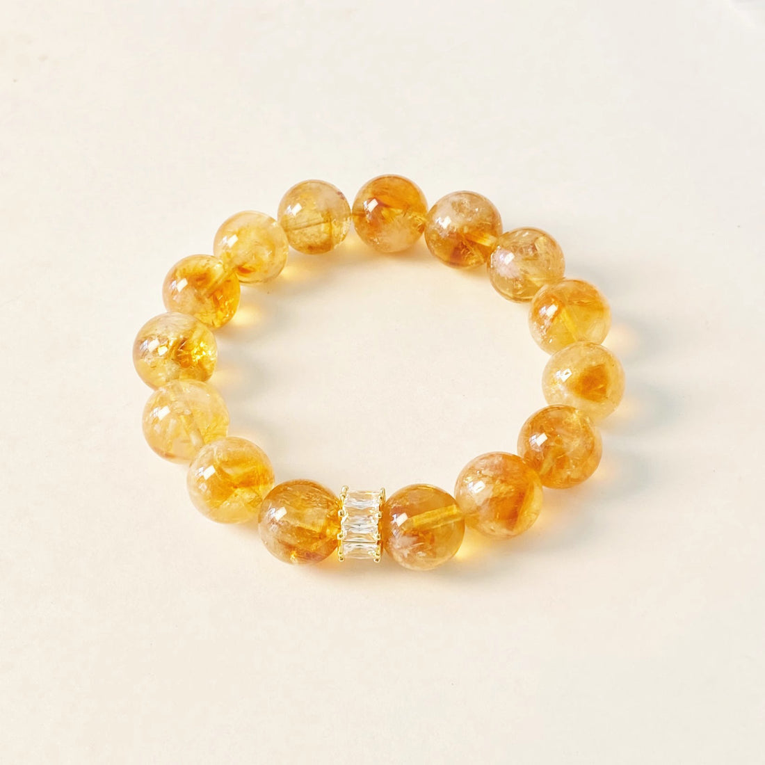 Yellow Aura Quartz Wealth Bracelet featuring a Citrine Tower bead for attracting success and abundance.