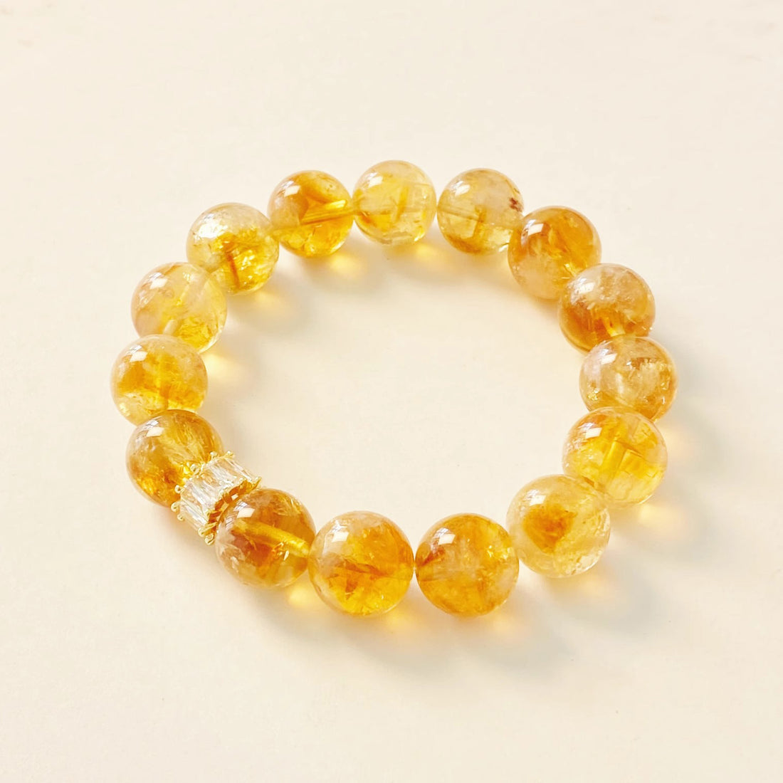 Yellow Aura Quartz Wealth Bracelet featuring a Citrine Tower bead for attracting success and abundance.