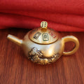 Fidget toy for anxiety relief - a heavy brass spinning teapot with a smooth mechanism to help improve focus.