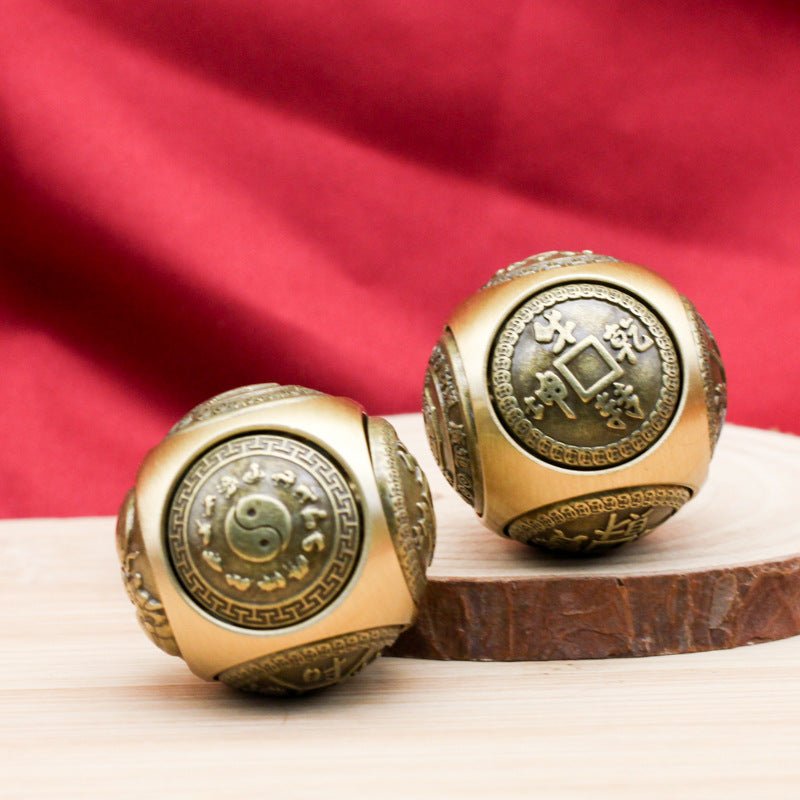 Feng Shui Brass Spin Ball, a stress relief fidget toy designed to attract good luck, wealth, and improve focus.