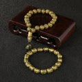 Amitabha Buddha bracelet in antique brass, featuring an adjustable design and sacred Sanskrit mantra for stacking.
