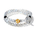 Two-layer bracelet featuring smooth gray moonstone beads and polished black onyx stones.