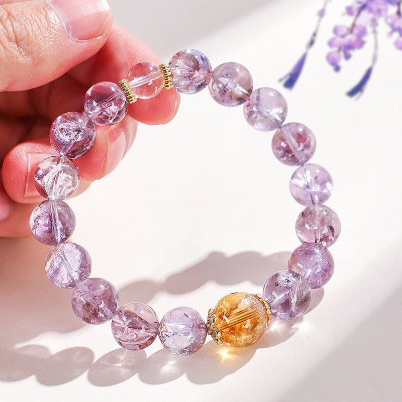 Purple Aura Quartz Bracelet with white crystal and yellow tower beads for chakra balancing and wealth manifestation.