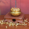 Feng Shui abundance bowl featuring the Double Fish (symbolizing年年有余) and Gold Ingots (symbolizing wealth) in solid brass.