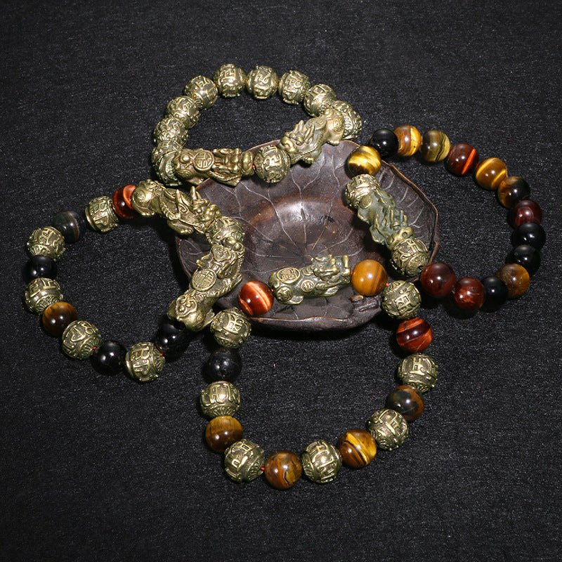 Harness the dual power of the Pi Yao charm and the Om Mani Padme Hum mantra on this protective black obsidian wealth bracelet.