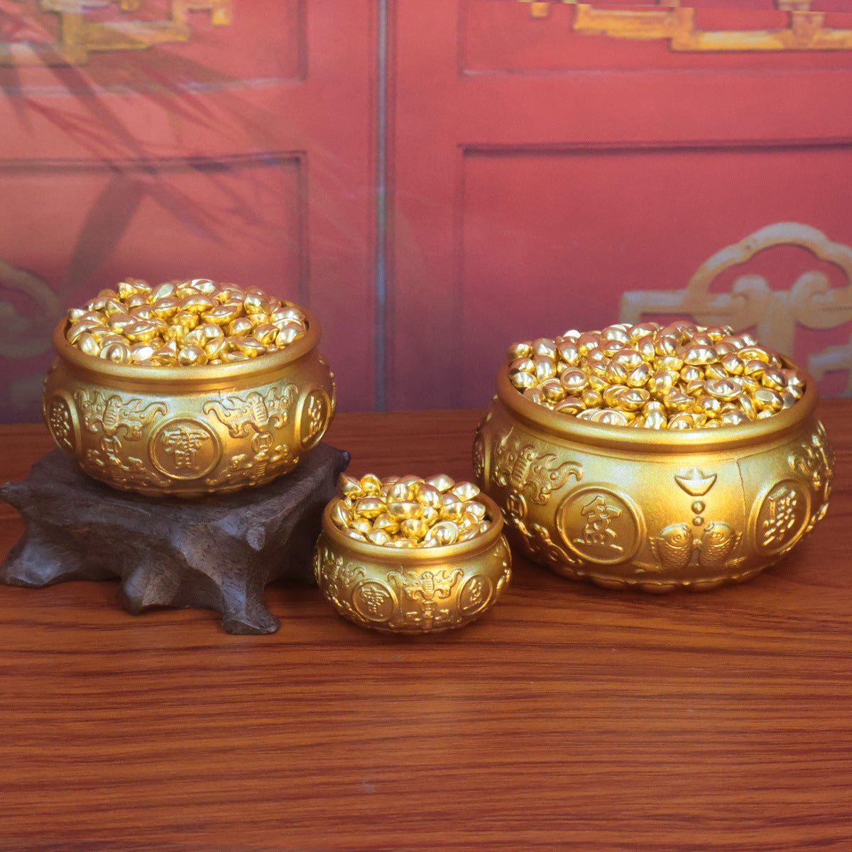 A traditional and potent Feng Shui cure for wealth: a solid brass bowl with double fish and ingots to gather prosperity chi.