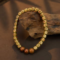 Engraved copper talisman bracelet featuring the sacred Taoist Golden Light Mantra.