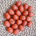 Red Stone crystal egg for vitality, courage, and stimulating the root chakra