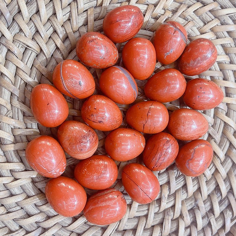 Red Stone crystal egg for vitality, courage, and stimulating the root chakra