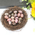 Rhodonite crystal egg for emotional balance, compassion, and healing emotional wounds