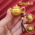 Personalized Snake Chinese Zodiac keychain, a wise spinning teapot luck charm for intuition, transformation, and elegance.