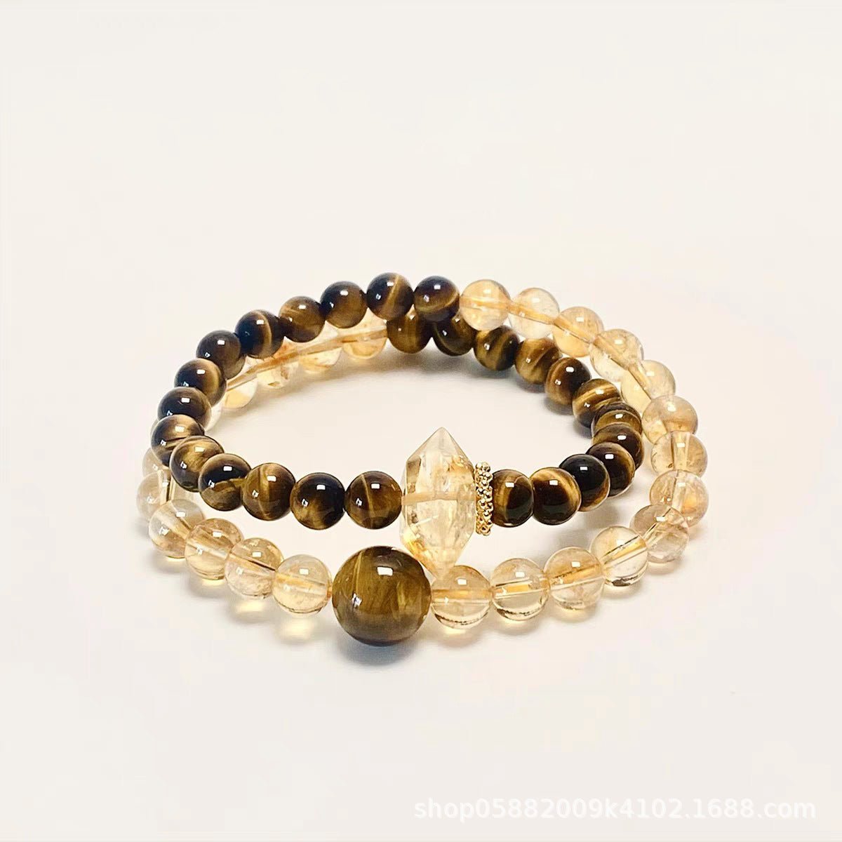 Double Wrap Bracelet made of Tiger's Eye and Citrine stones for attracting wealth and protection.
