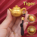 Personalized Tiger Zodiac keychain with spinning teapot, a brave charm and fidget toy for courage and powerful energy.