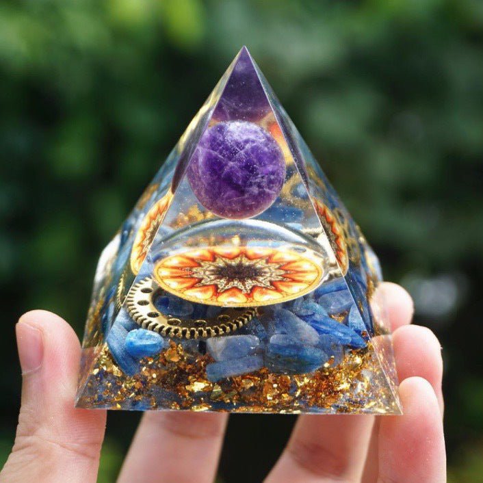 crystal energy pyramid with sun gear design for meditation and chakra balancing.