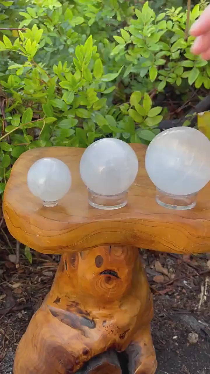 Natural Moroccan Selenite Sphere, a crystal ball for energy cleansing, deep meditation, and Reiki healing practices.
