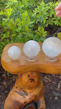 Natural Moroccan Selenite Sphere, a crystal ball for energy cleansing, deep meditation, and Reiki healing practices.