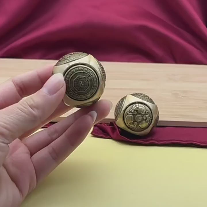 Feng Shui Brass Spin Ball, a stress relief fidget toy designed to attract good luck, wealth, and improve focus.
